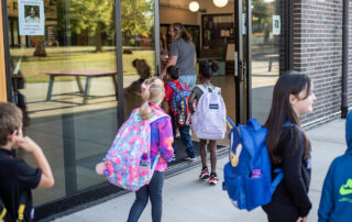 Kids going into school.